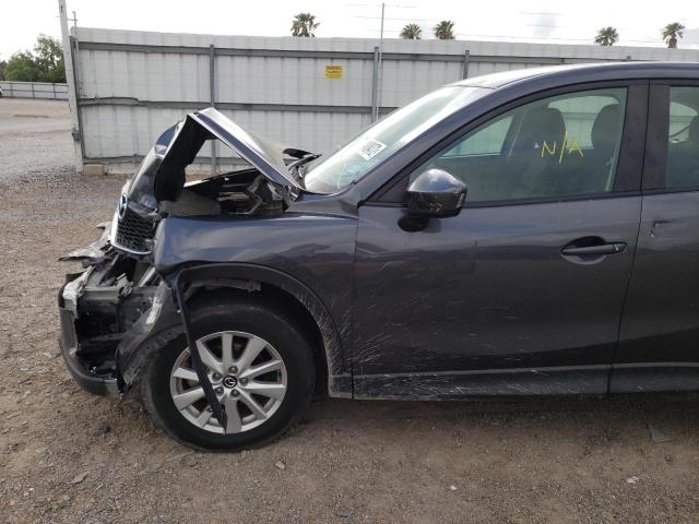 Photo 9 from auction – 2014 MAZDA CX-5 SPORT with VIN JM3KE2BE4E0336876