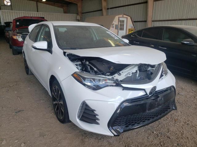 TOYOTA COROLLA L 2019 with VIN 5YFBURHE0KP895628 - Photo from auction