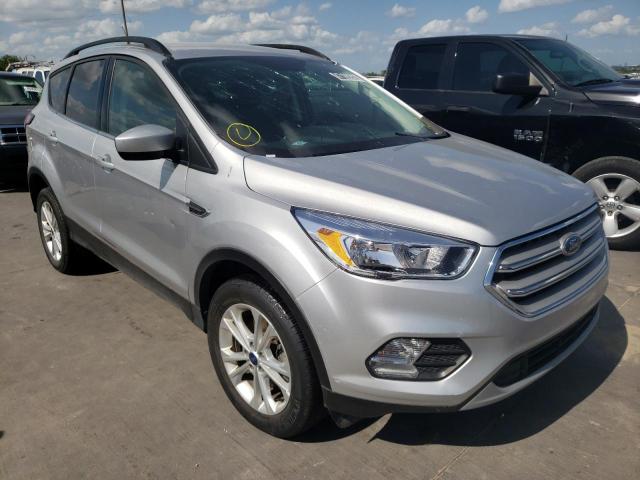 FORD ESCAPE SE 2018 with VIN 1FMCU9GD8JUC04615 - Photo from auction