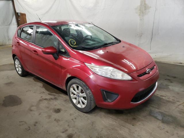 FORD FIESTA SE 2011 with VIN 3FADP4EJ7BM105467 - Photo from auction
