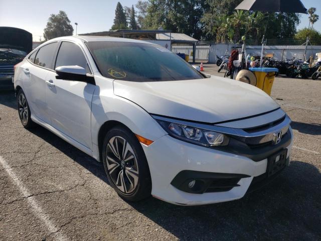 HONDA CIVIC EX 2017 with VIN 2HGFC1F39HH654769 - Photo from auction