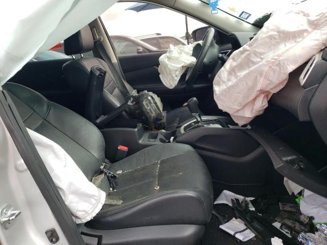 Photo 5 from auction – 2014 NISSAN ROGUE S with VIN 5N1AT2MT7EC765798