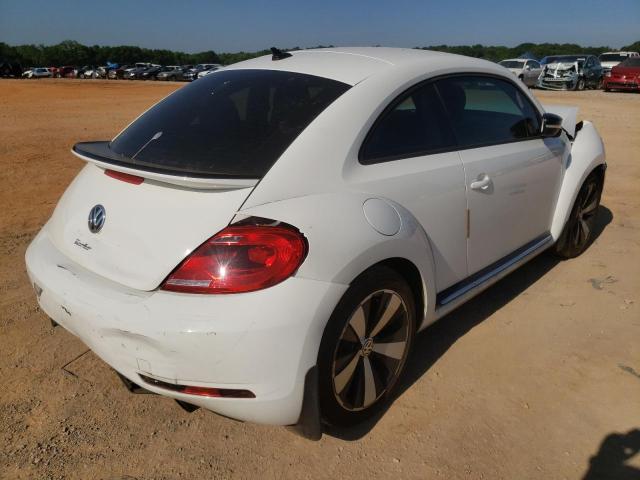 Photo 4 from auction – 2014 VOLKSWAGEN BEETLE TUR with VIN 3VWVS7AT5EM600919