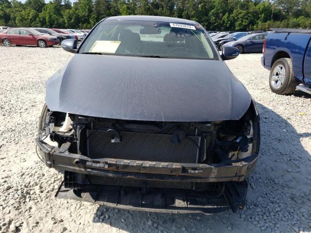 Photo 9 from auction – 2015 KIA OPTIMA LX with VIN KNAGM4A72F5571343