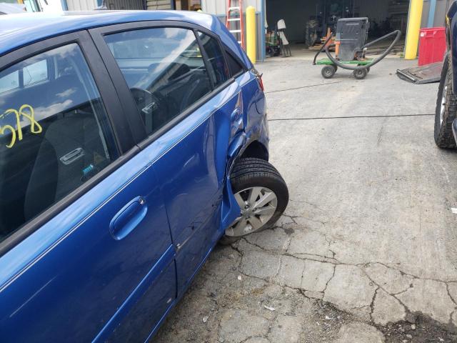 Photo 9 from auction – 2010 KIA RIO LX with VIN KNADH5A31A6668398