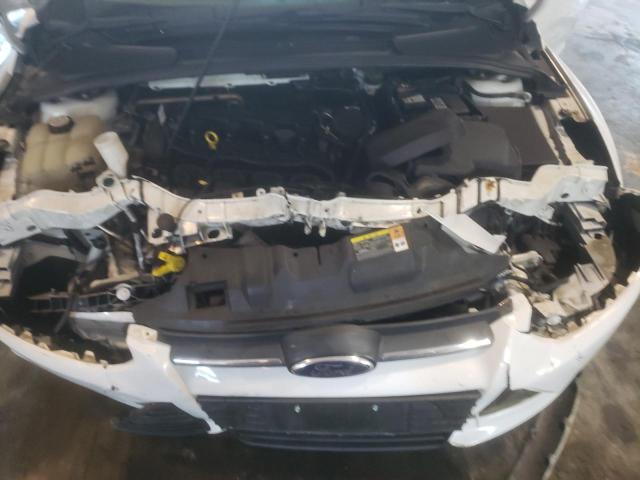 Foto 7 de la subasta – 2013 FORD FOCUS SE con VIN 1FADP3F24DL294715