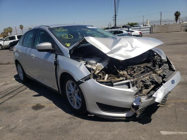 FORD FOCUS SE 2018 with VIN 1FADP3F29JL250673 - Photo from auction