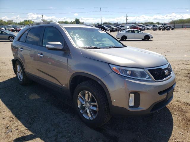 KIA SORENTO LX 2015 with VIN 5XYKTCA67FG584968 - Photo from auction