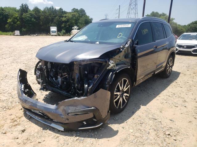 Photo 2 from auction – 2021 HONDA PILOT ELIT with VIN 5FNYF6H03MB051685