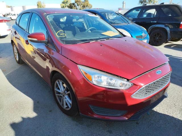 FORD FOCUS SE 2015 with VIN 1FADP3K21FL369749 - Photo from auction
