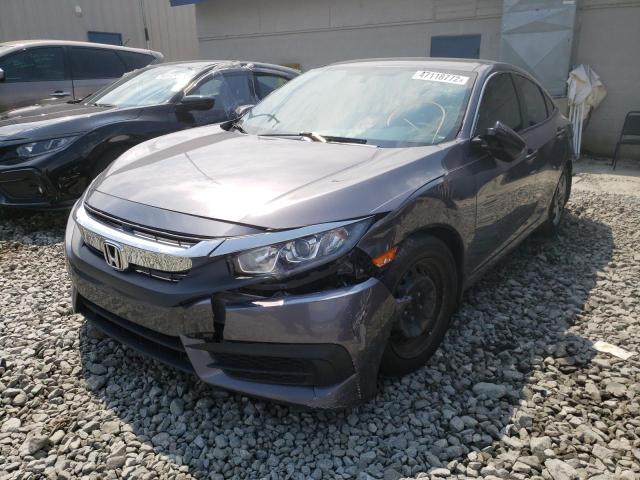 Photo 2 from auction – 2018 HONDA CIVIC LX with VIN 19XFC2F52JE001949