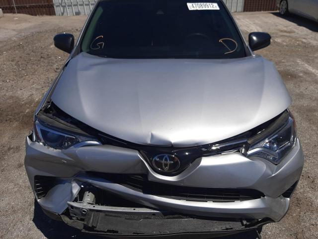 Photo 7 from auction – 2018 TOYOTA RAV4 LE with VIN 2T3ZFREV9JW515624
