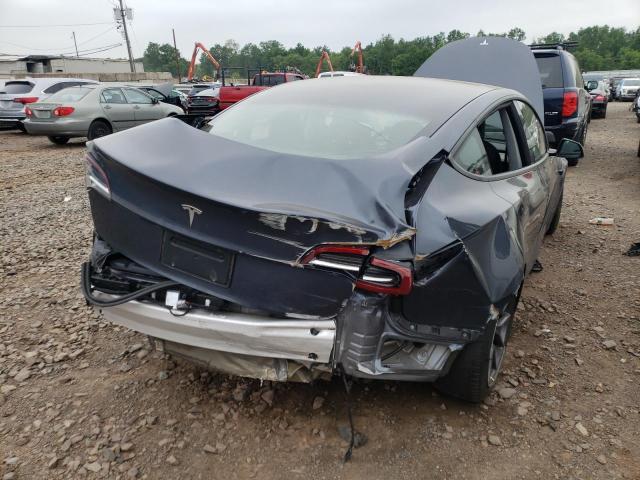 Photo 9 from auction – 2021 TESLA MODEL 3 with VIN 5YJ3E1EAXMF086351