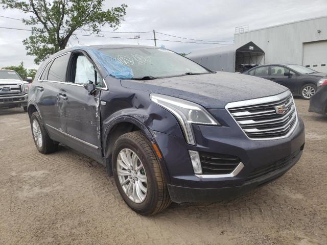 CADILLAC XT5 2019 with VIN 1GYKNBRS1KZ166031 - Photo from auction