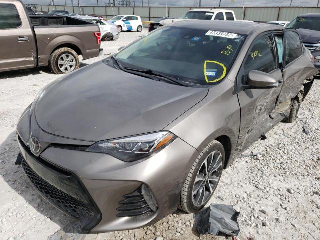 Photo 2 from auction – 2018 TOYOTA COROLLA L with VIN 5YFBURHE2JP749858