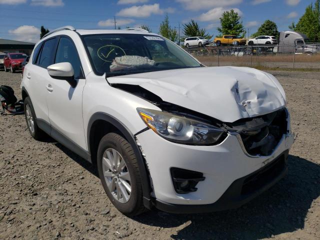 MAZDA CX-5 TOURI 2016 with VIN JM3KE4CY0G0653092 - Photo from auction