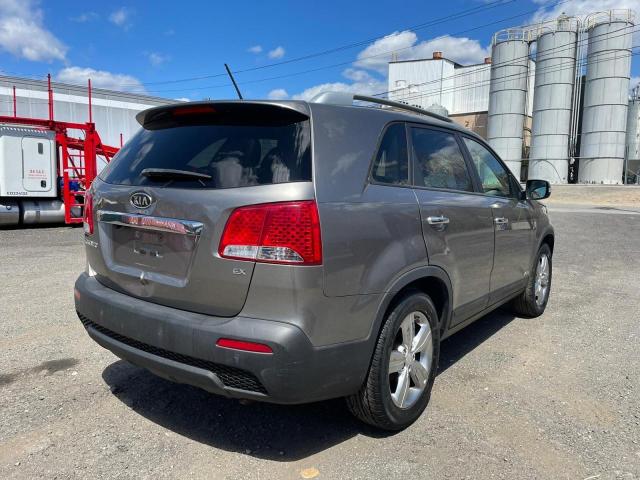 Photo 4 from auction – 2013 KIA SORENTO EX with VIN 5XYKUDA61DG393319