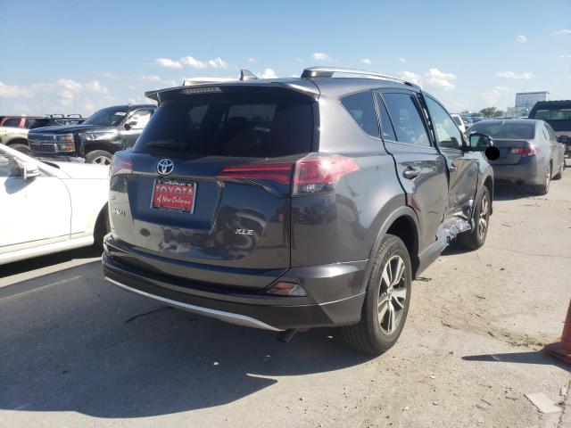 Photo 4 from auction – 2017 TOYOTA RAV4 XLE with VIN JTMWFREV5HD100651