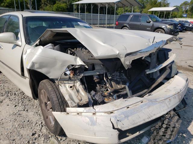Photo 9 from auction – 2004 LINCOLN TOWN CAR U with VIN 1LNHM83W34Y604280