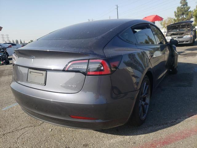 Photo 4 from auction – 2021 TESLA MODEL 3 with VIN 5YJ3E1EB5MF995817