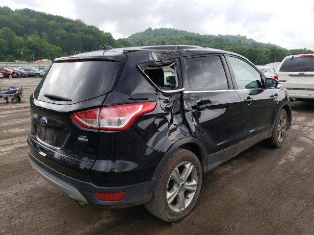 Photo 4 from auction – 2016 FORD ESCAPE SE with VIN 1FMCU9GX3GUC13354