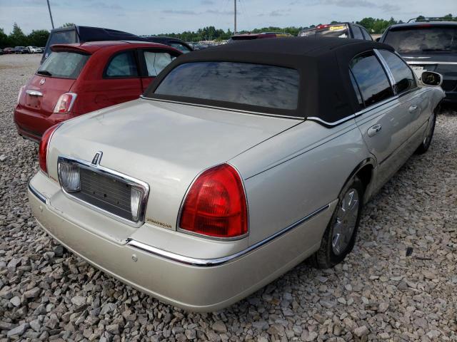 Photo 4 from auction – 2004 LINCOLN TOWN CAR U with VIN 1LNHM83W74Y677572