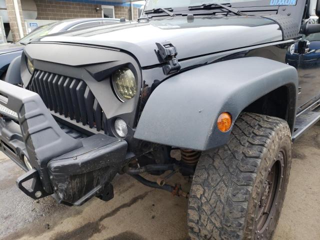 Photo 9 from auction – 2014 JEEP WRANGLER U with VIN 1C4BJWDG7EL133490