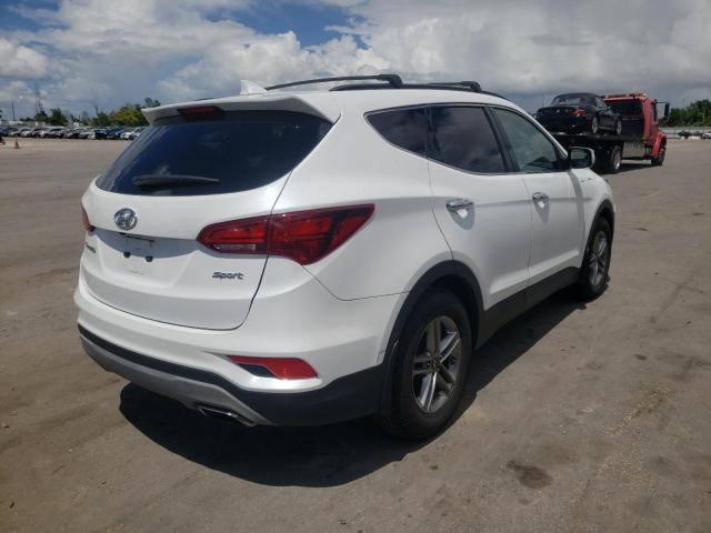 Photo 4 from auction – 2018 HYUNDAI SANTA FE S with VIN 5NMZU3LB2JH083801