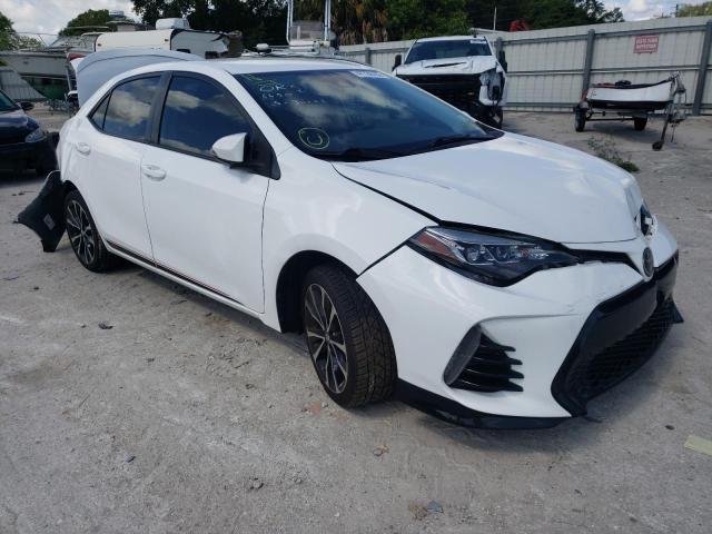 TOYOTA COROLLA L 2017 with VIN 5YFBURHE4HP725118 - Photo from auction