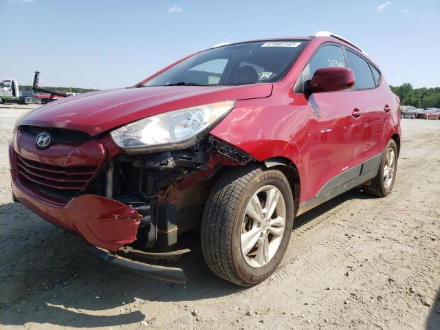Photo 2 from auction – 2011 HYUNDAI TUCSON GLS with VIN KM8JUCACXBU212477