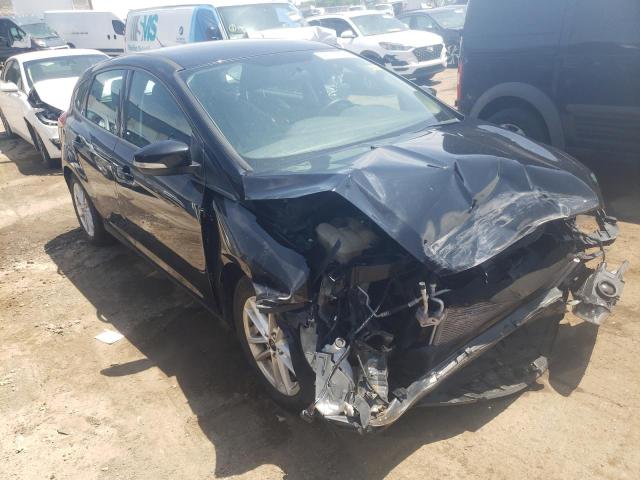 FORD FOCUS SE 2017 with VIN 1FADP3K25HL204323 - Photo from auction