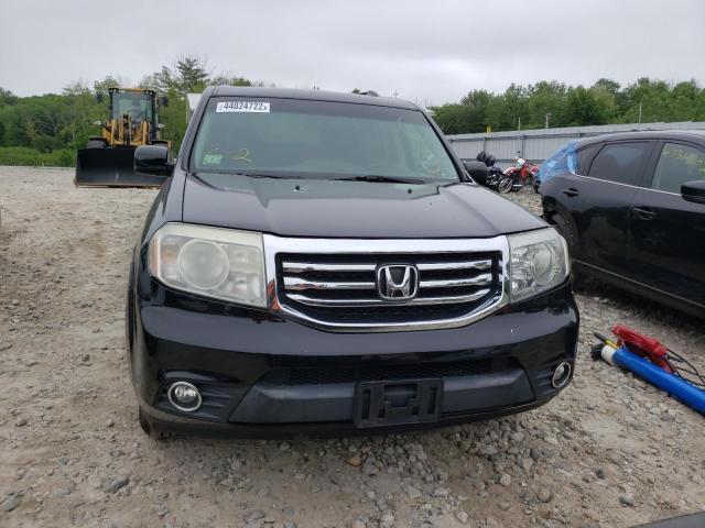 Фото 7 с аукциона – 2011 HONDA PILOT TOUR с VIN 5FNYF4H92BB007807