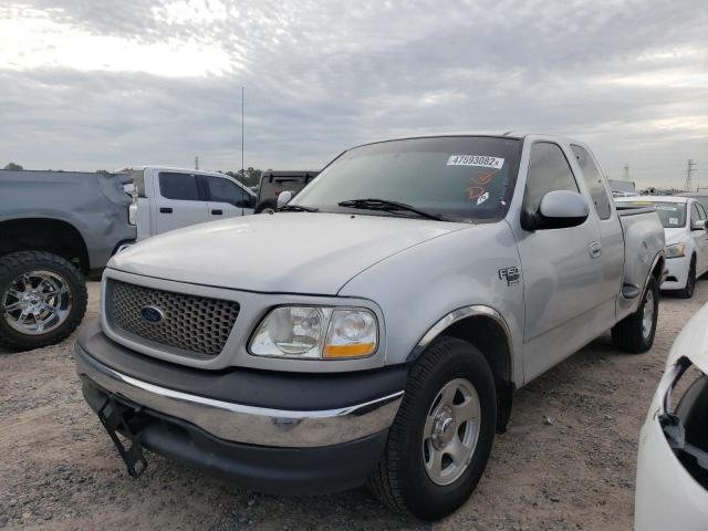 Photo 2 from auction – 2000 FORD F150 with VIN 1FTRX07L9YKA69143