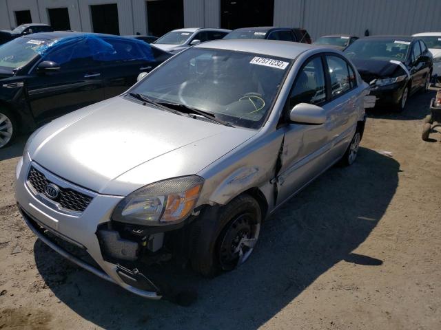 Photo 2 from auction – 2011 KIA RIO BASE with VIN KNADH4A30B6857149