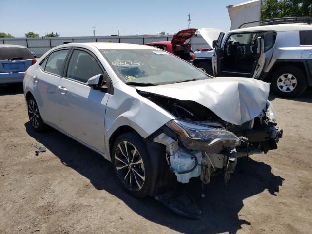 TOYOTA COROLLA L 2019 with VIN 5YFBURHE0KP874892 - Photo from auction