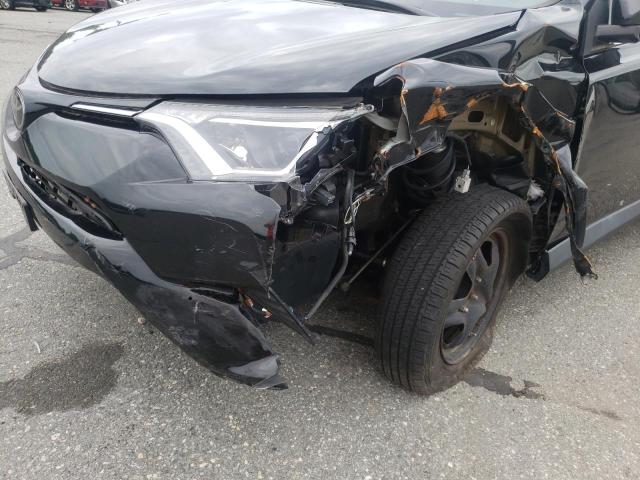 Photo 9 from auction – 2017 TOYOTA RAV4 LE with VIN 2T3BFREV8HW580928