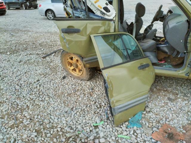 Photo 9 from auction – 2000 CHEVROLET TRACKER with VIN 2CNBJ13C8Y6949702