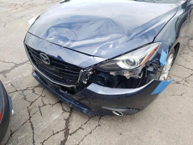 Photo 9 from auction – 2014 MAZDA 3 TOURING with VIN JM1BM1L35E1215125