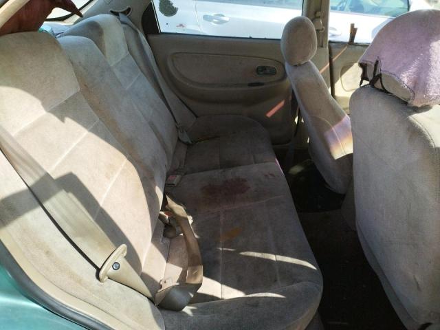 Photo 6 from auction – 2000 KIA SEPHIA BAS with VIN KNAFB1212Y5847324