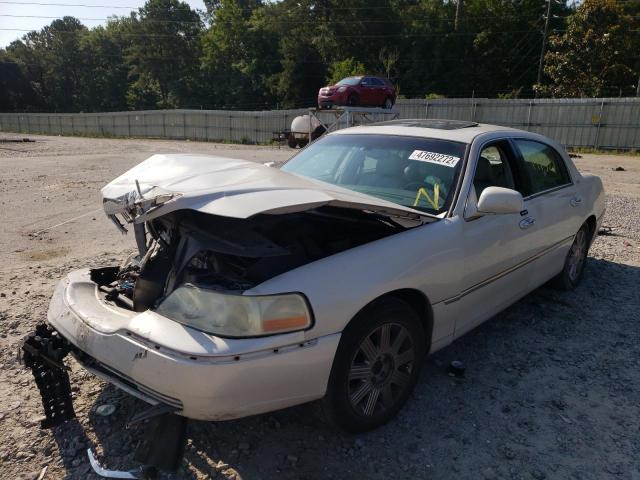 Photo 2 from auction – 2004 LINCOLN TOWN CAR U with VIN 1LNHM83W34Y604280