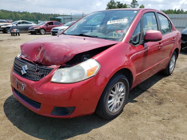Photo 2 from auction – 2012 SUZUKI SX4 LE with VIN JS2YC5A34C6303435