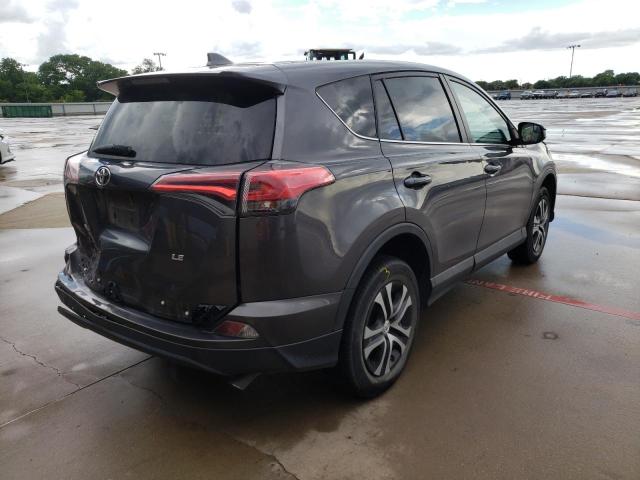 Photo 4 from auction – 2018 TOYOTA RAV4 LE with VIN 2T3ZFREV8JW450457
