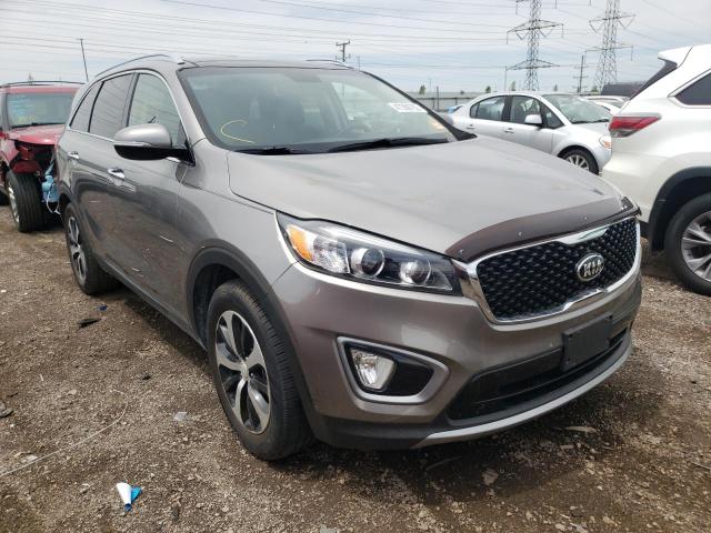KIA SORENTO EX 2016 with VIN 5XYPH4A5XGG045895 - Photo from auction