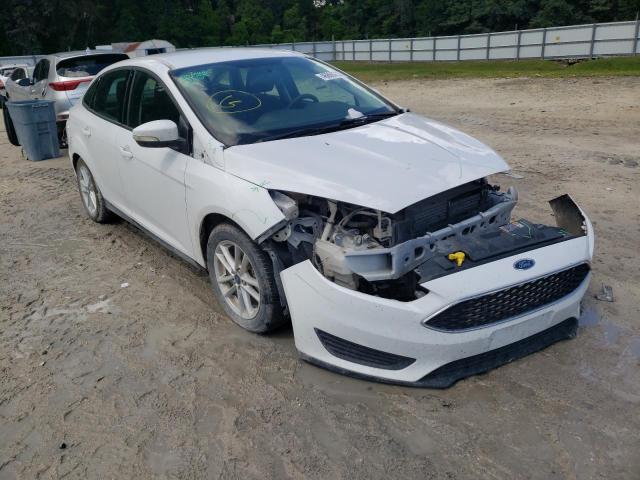 FORD FOCUS SE 2016 with VIN 1FADP3F25GL348575 - Photo from auction