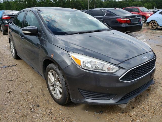 FORD FOCUS SE 2016 with VIN 1FADP3F2XGL389719 - Photo from auction