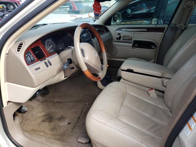 Photo 5 from auction – 2004 LINCOLN TOWN CAR U with VIN 1LNHM83W74Y677572