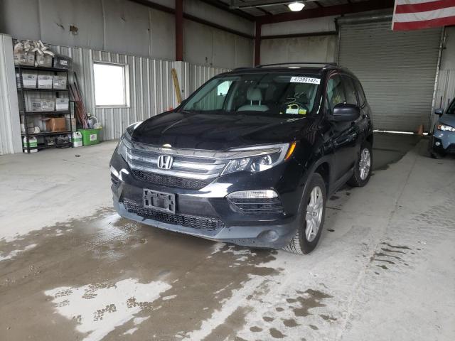 Photo 2 from auction – 2018 HONDA PILOT LX with VIN 5FNYF6H17JB023019