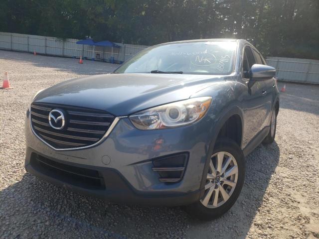 Photo 2 from auction – 2016 MAZDA CX-5 SPORT with VIN JM3KE2BY8G0650415