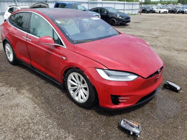 TESLA MODEL X 2017 with VIN 5YJXCAE2XHF055252 - Photo from auction