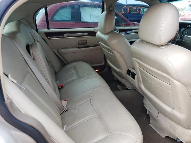 Photo 6 from auction – 2004 LINCOLN TOWN CAR U with VIN 1LNHM83W74Y677572